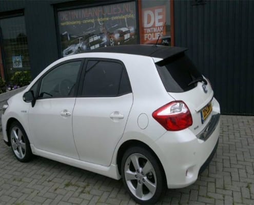 Toyota Auris wit blindering ramen